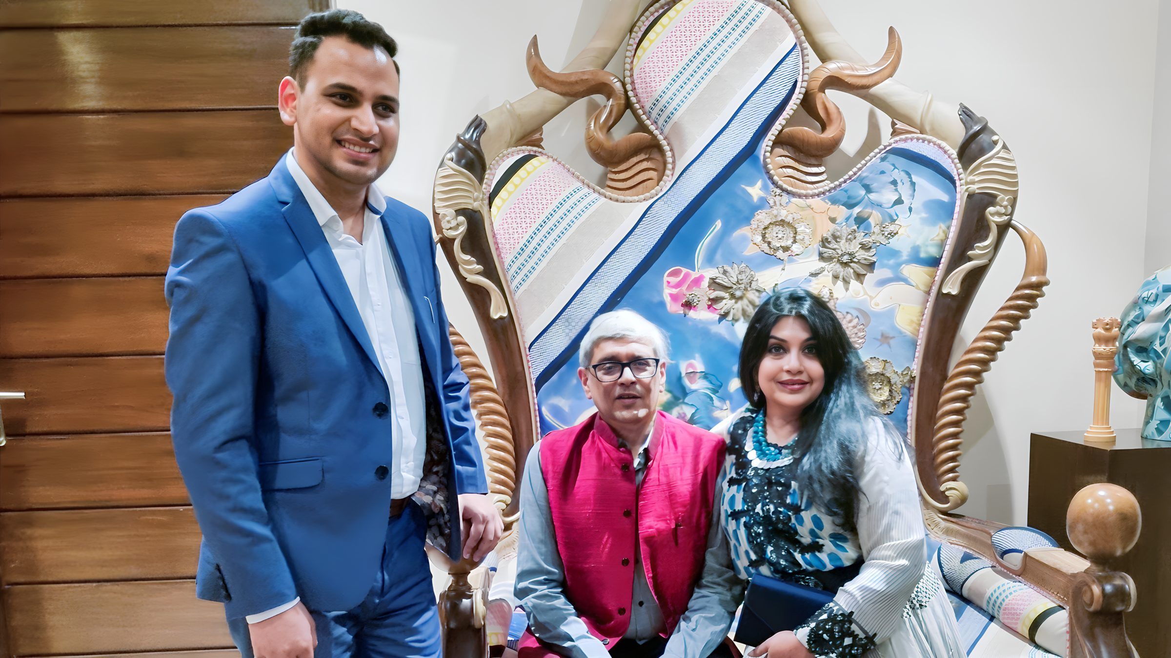 Lithvik Mukesh Sharma is photographed with an economist, author, and writer and his wife.