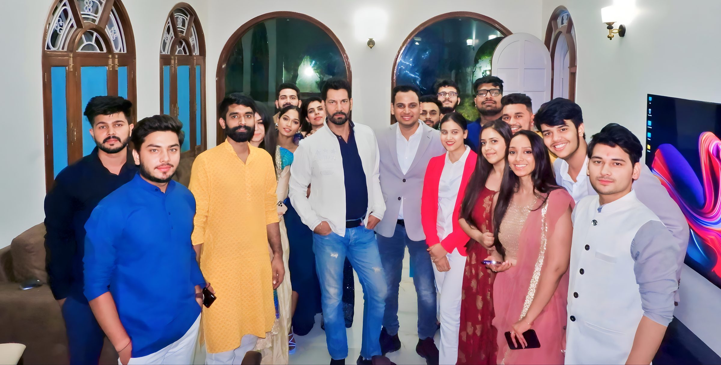 Lithvik Mukesh Sharma is photographed with Dr. Jyoti Kush and Jasbir Jassi at a Diwali party.