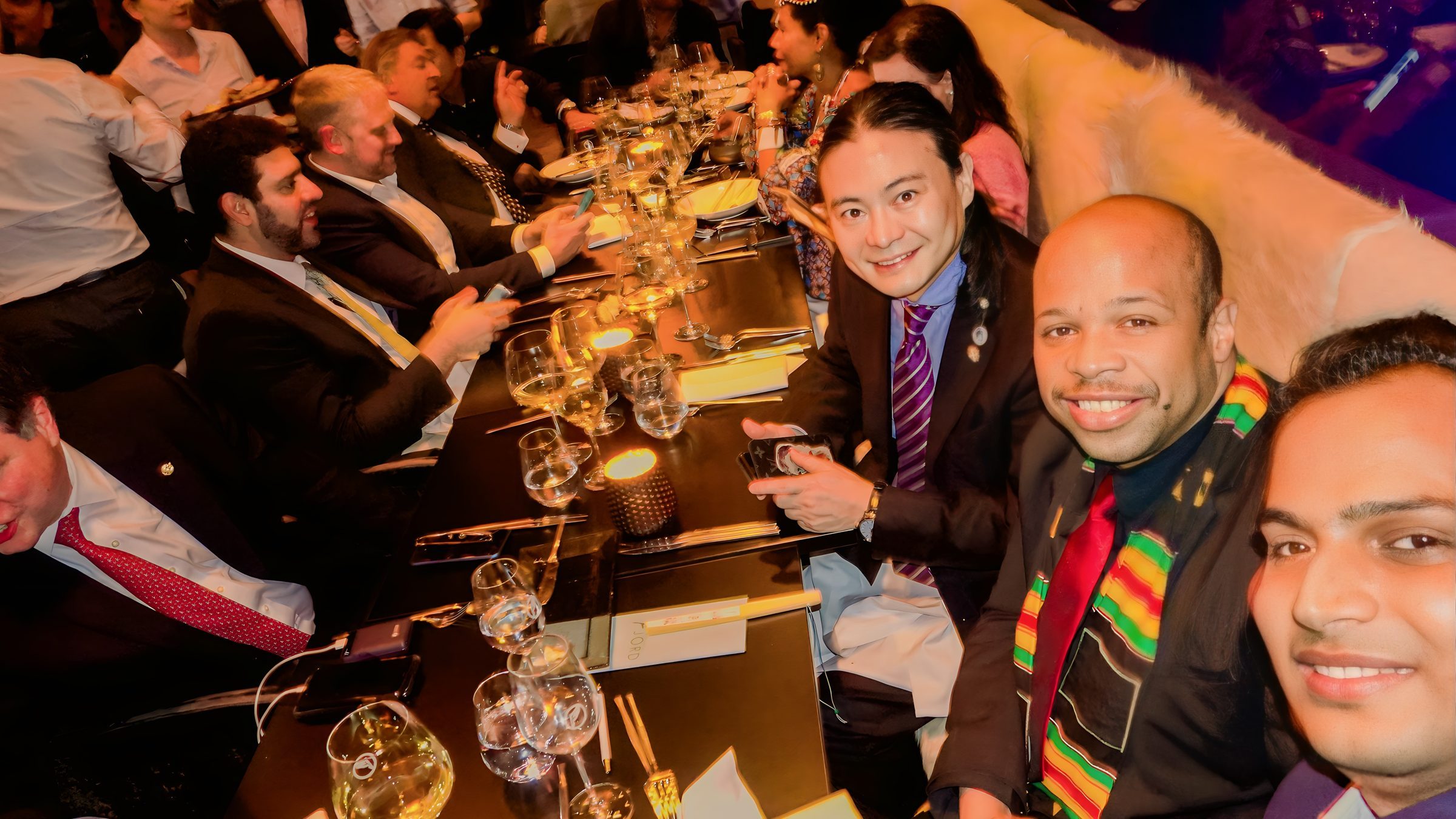Lithvik Mukesh Sharma is photographed with His Excellency Dr. Louis-Georges Tin at the African Diaspora summit.