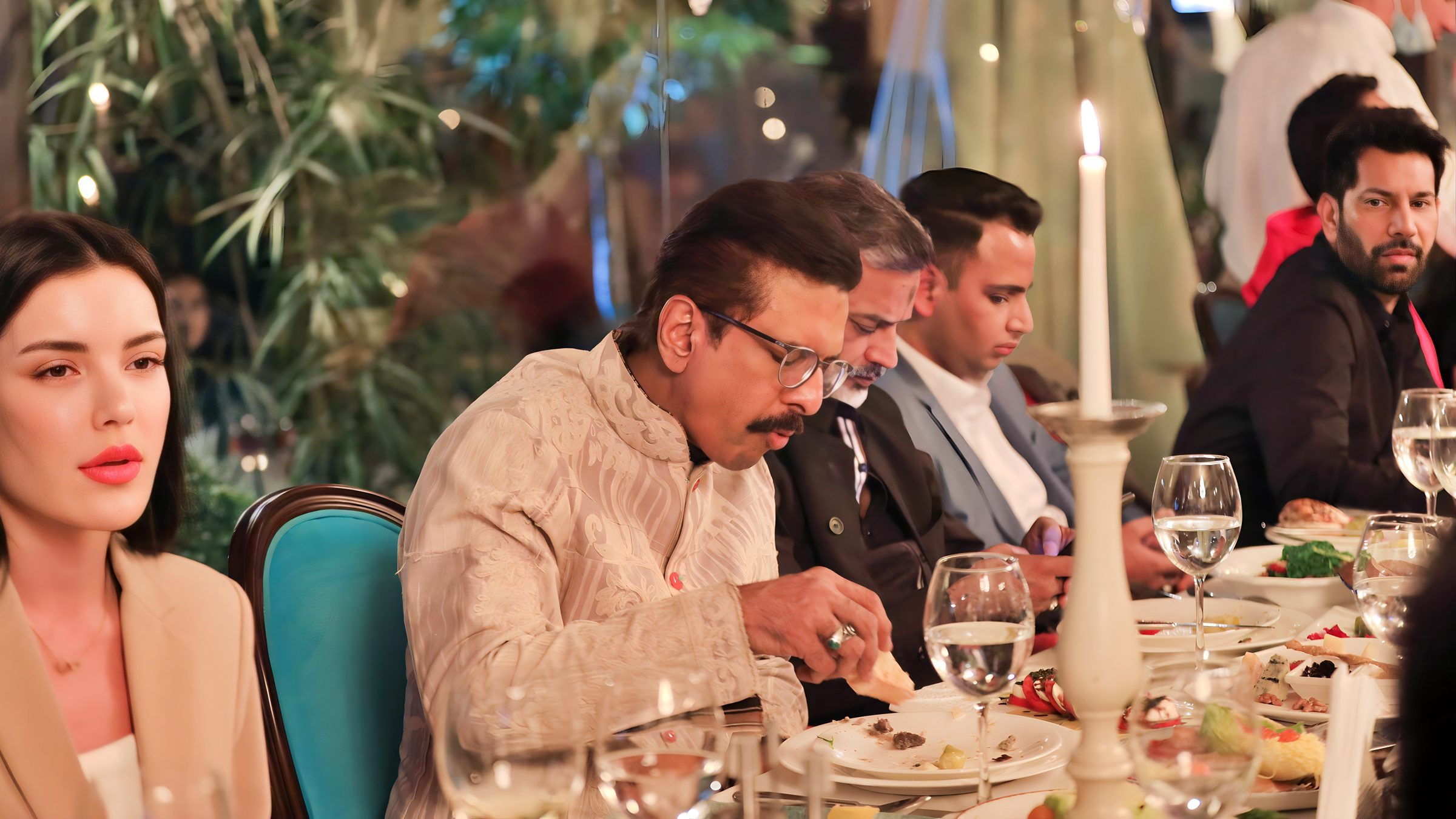 Lithvik Mukesh Sharma is photographed with Mika Singh.