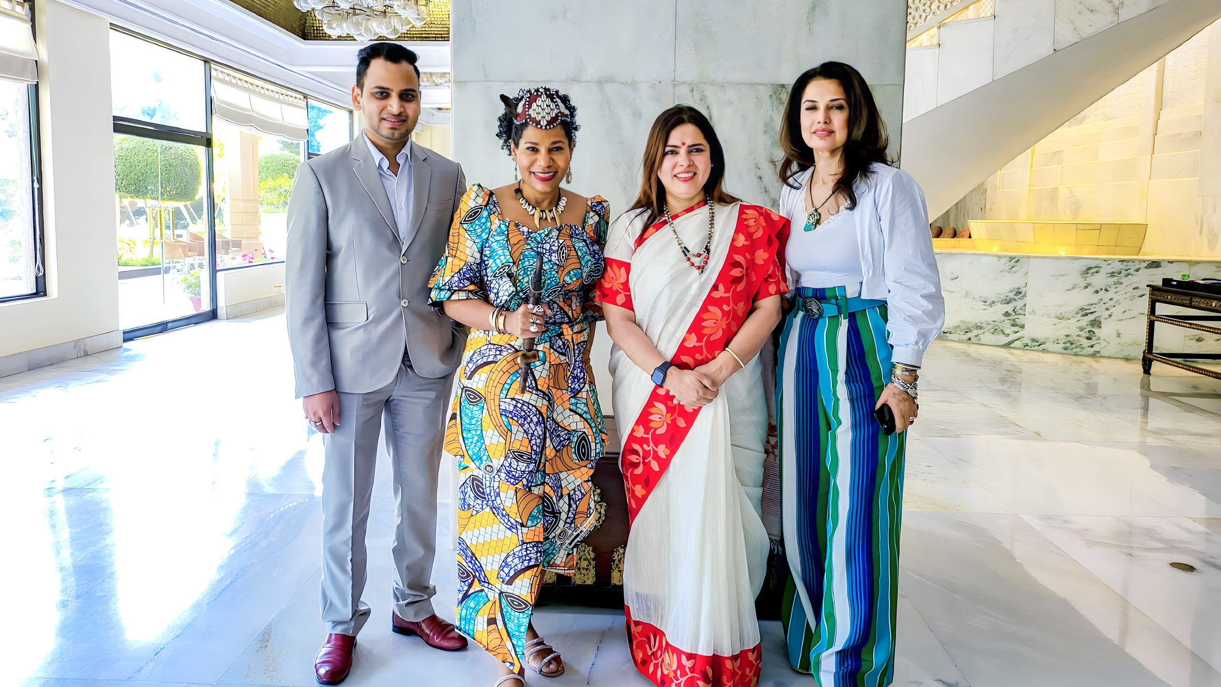 Lithvik Mukesh Sharma is photographed with Queen Diambi, Meenakshi Lekhi, and Ritu Beri at the Taj.