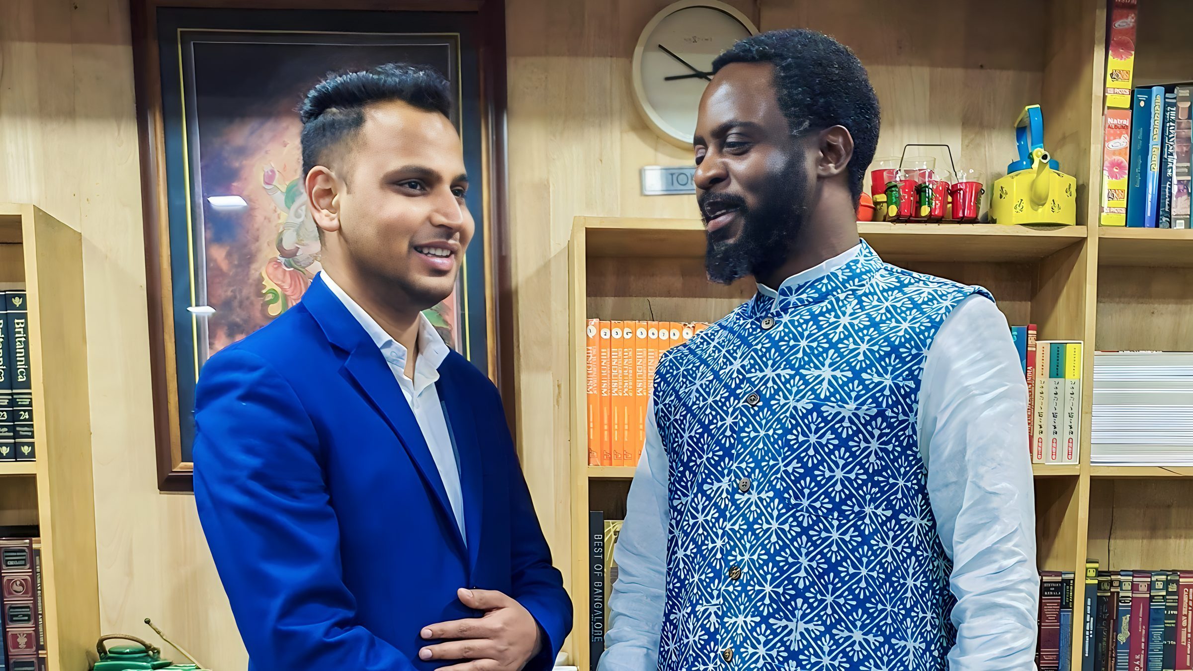Lithvik Mukesh Sharma is photographed with Dr. Saviour Chishimba at a celebration